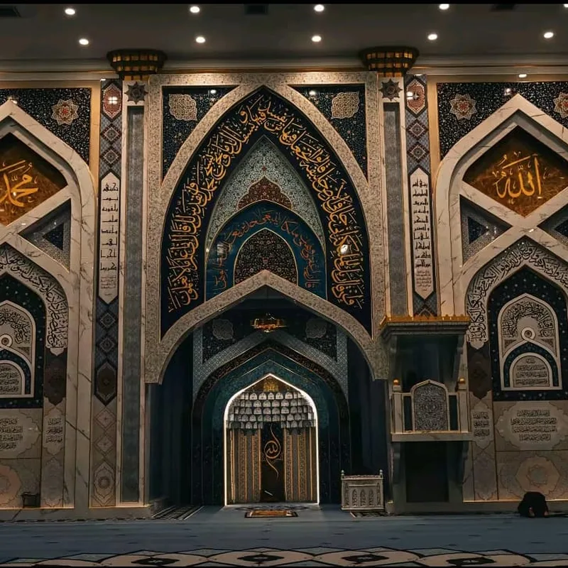 Ornate mihrab wall with gold calligraphy and geometric tilework